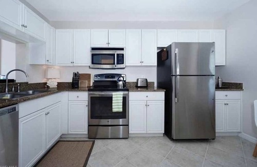 North Naples Condominio | Paraíso de vacaciones en "SUNSET TIDES" Emerald Lakes en North Naples!