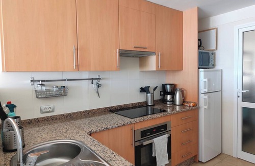 Poris de Abona Apartamento | Vacation 'Vista Bahia' with Sea View, Shared Pool and Wi-Fi
