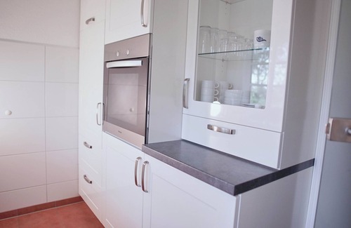Norddorf Apartamento | Vacation with dog, incl. swimming pool and sauna, upper floor over 2 levels up to 4 persons