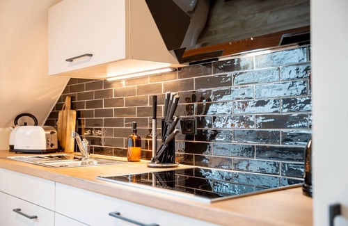 Scholderup Apartamento | Vacations with design - Bowie vacation apartment on the Taarstedt vacation farm in Angelit
