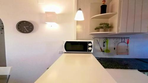 L'Escala Apartamento | VACAY Apartamento Ibiza, piscina y relax! en la Costa brava, L'Escala!