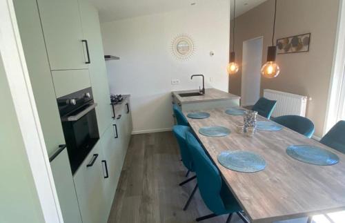 Scherpenisse Chalet De Esquí | Vakantiepark de Zeeuwse Parel - de Schelde