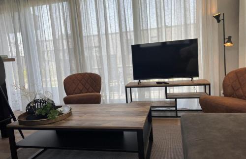 Scherpenisse Chalet De Esquí | Vakantiepark de Zeeuwse Parel - de Zeebries