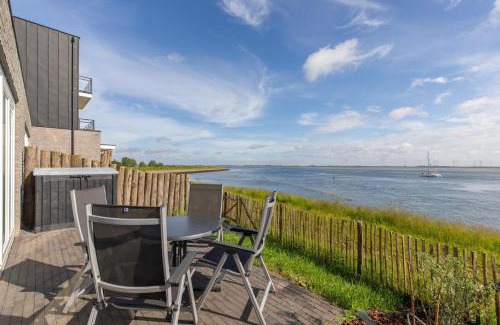 Sint-Annaland Apartamento | Vakantiewoning aan het strand - tuin en terras met haven- & zeezicht - Vista Maris - Nr 14