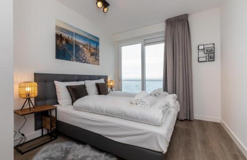Sint-Annaland Apartamento | Vakantiewoning aan het strand - tuin en terras met haven- & zeezicht - Vista Maris - Nr 14
