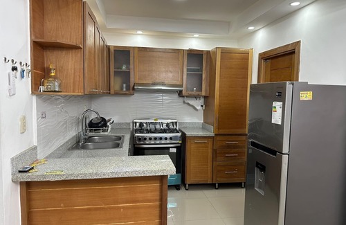 Tropical del Este Apartamento | Ven y siéntete como en casa con este confortable apartamento céntrico