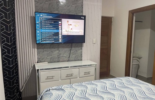 Tropical del Este Apartamento | Ven y siéntete como en casa con este confortable apartamento céntrico