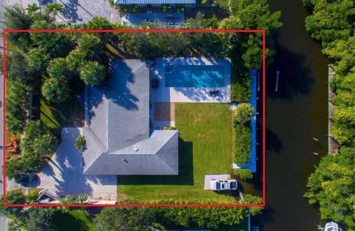 Vero Beach Casa | Vero Beach Island private gated scantuary with pool, 60' boat dock & kayak launch!