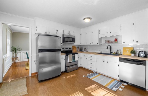 North Raleigh Casa | Vibrant 4BR home with outdoor patio, 5mins to North Hills. Pet-friendly!