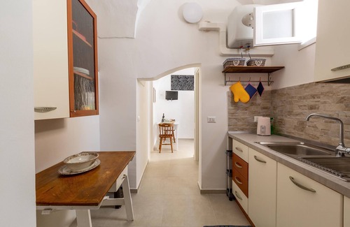 Tuglie Casa | Vico dei Mille by BarbarHouse