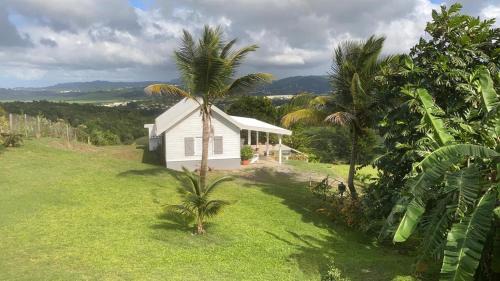 Riviere-Salee Casa | Villa 1 de standing 80m2 avec piscine et vue imprenable sur la mer et sur la campagne