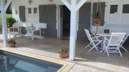 Riviere-Salee Casa | Villa 1 de standing 80m2 avec piscine et vue imprenable sur la mer et sur la campagne