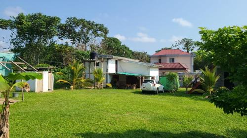 Kribi Villa | Villa 1200m2 de jardin "100m plage"