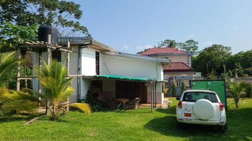 Kribi Villa | Villa 1200m2 de jardin "100m plage"