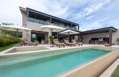 Punta de Mita Casa | Villa Amada at Porta Fortuna Ocean Views Staff Golf Cart by Mita Residential
