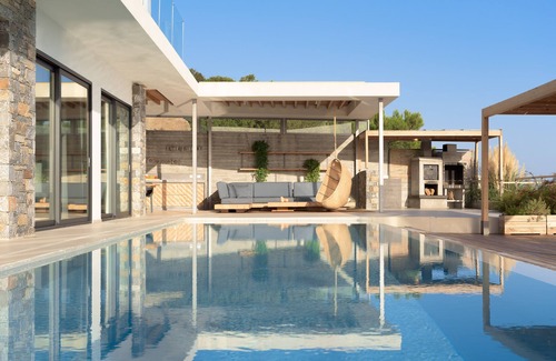 Koutsounari Villa | Villa Ammos, 4 habitaciones, 4 baños, piscina, área de comedor y sala de estar interior