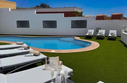 Costa Adeje Villa | Villa Amorio a spacious modern getaway with a private heated pool & Sea Views