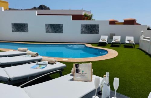 Costa Adeje Villa | Villa Amorio a spacious modern getaway with a private heated pool & Sea Views