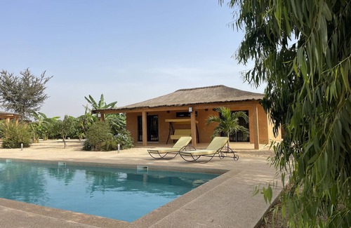 Nianing Casa | Villa Assinie, a privileged space around a 16 m Californian swimming pool