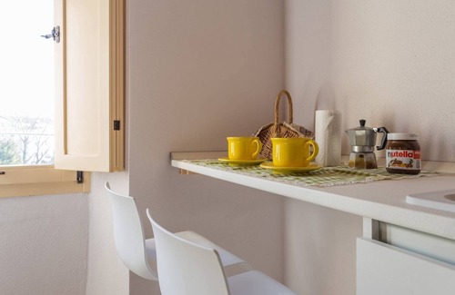 Sigillo Apartamento | Villa Costanzi: Comfy Apartment Below The Cucco