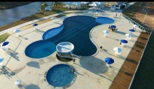 Estancia Apartamento | Villa das Águas - Térreo frente lago