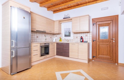 Antiparos Casa | Villa en una zona tranquila con vistas al puerto pesquero, a pocos metros de la playa de arena.