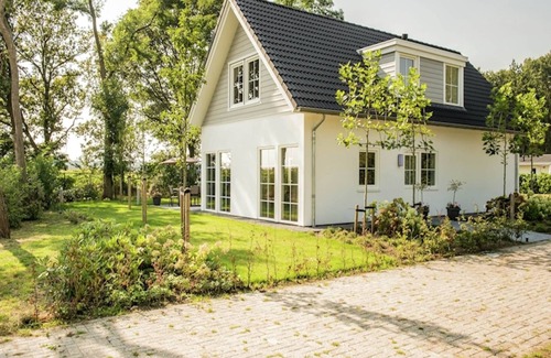 Baarle-Nassau Casa | Villa en Parc de Kievit con Jardín y Chimenea