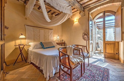 Pienza Villa | Villa Irmina, fully refundable with voucher*: A characteristic and welcoming two-story ancient tuscan country house surrounded by meadows and by green hills, with Free WI-FI.