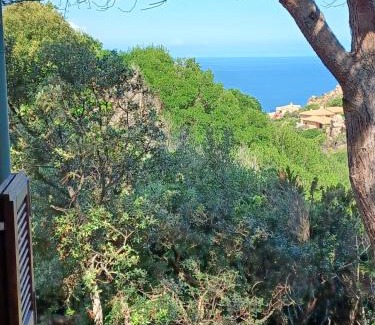 Trinita d'Agultu e Vignola Casa | Villa La Lecceta surrounded by greenery and sea view with sunset