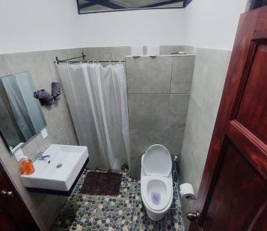 Chiguata Apartamento | Villa Los Altos - Private Tree Suite Roof Top walk to Playa Chiquita