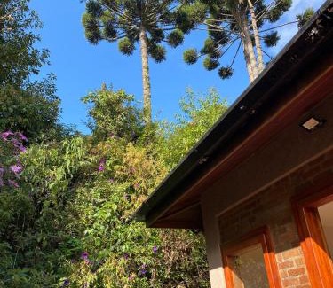 Campos do Jordao Apartamento | Villa Mantiqueira - Studio II - Com lareira e área verde