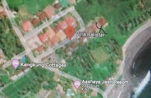 Jasri Villa | Villa met uitzicht op sawa en daarachter de zee op een prachtige locatie