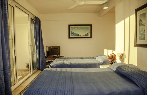 Puerto Ángel Cama Y Desayuno | Villa Mykonos / Double DeluxeVilla Mykonos / Double DeluxeVilla