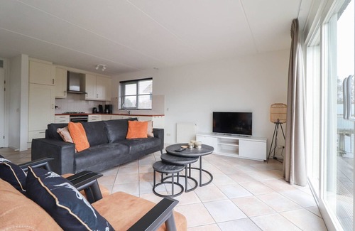 Makkum Villa | Chalet sobre el agua con sauna en Frisia
