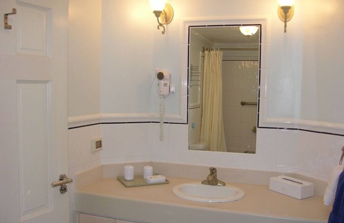 Lowlands Villa | Whole Villa - Villa caribeña con piscina junto al mar en el campo de golf de campeonato