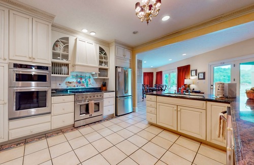 Lake Lure Casa | Villa Rosa: All-Suite lakefront chateau with private infinity pool & beach