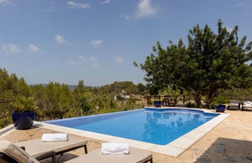 Sant Agusti des Vedra Villa | Villa Shera, casa ibicenca con vistas al mar, piscina en zona privada con mucho encanto