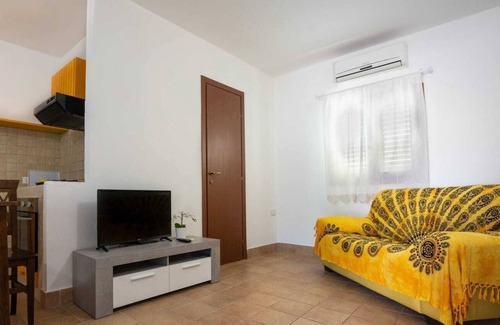 Lampedusa Villa | Villa rodeada de vegetación