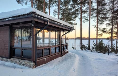 Tahkovuori Villa | Villa Valkama with optional beach sauna + jacuzzi