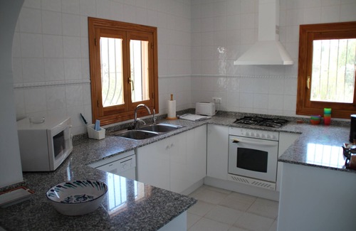 Orba Villa | Villa con piscina privada, terraza y porche con vistas al mar.