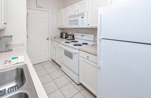 Rehoboth Beach Condominio | Villas at Bay Crossing dog-friendly condo with pool, balcony, water views, & W/D