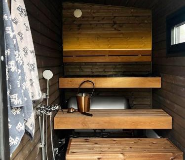 Muonio Chalet De Esquí | Visit Lapelland - Borealis Village with a Nature View, Fireplace, Sauna, Kitchen