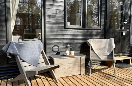 Muonio Chalet De Esquí | Visit Lapelland - Borealis Village with a Nature View, Fireplace, Sauna, Kitchen