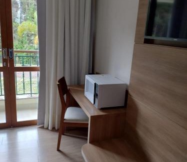 Pedra Azul Apartamento | Vista Azul Apart Hotel - Suítes com vista para a mata de pinheiros