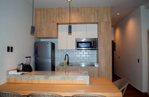 Cerritos Apartamento | Vista de playa y alberca de lujo