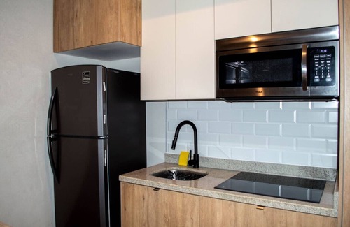 Cerritos Apartamento | Vista de playa y alberca de lujo