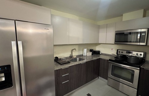 Arouca Condominio | Vive Luxe Condo , Pool & 24/7 Security near Airport
