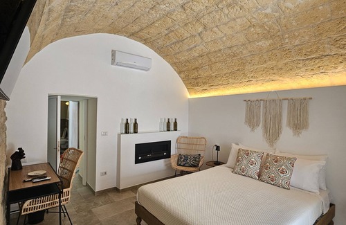 Trani Cama Y Desayuno | Volpe e Uva Winesuites & Spa