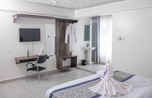Biashara Hotel | WAFFLES SUITES