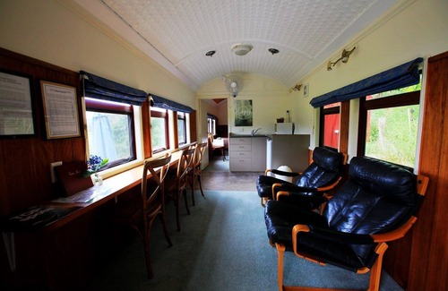 Waitomo Caves Casa | Waitomo Express - 1918 Vagón de tren Cambiar listado Vista previa listado